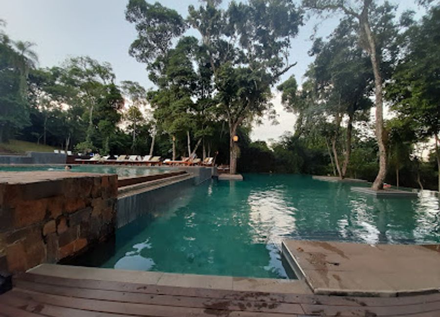 Experience authentic Argentine flavors at Naipi Restaurant amidst breathtaking natural beauty in Puerto Iguazú.