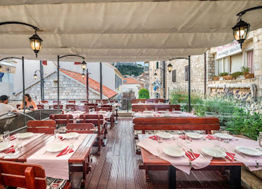 Discover authentic Croatian barbecue and seafood at Konoba Bonaca in beautiful Hvar - a must-visit culinary gem!