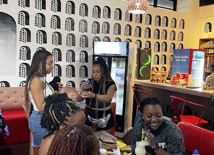 Experience authentic Ghanaian cuisine at Anomansa Restaurant near Elmina Castle - where culinary delight meets rich history.