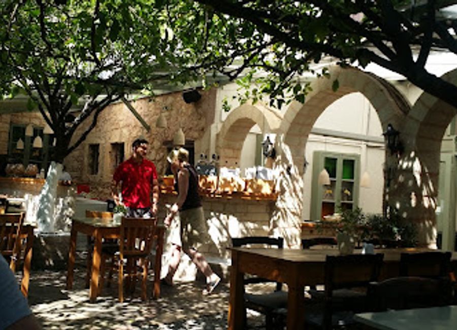 Experience authentic Greek cuisine at Lemonokipos Restaurant in Rethymno, where delightful flavors meet a picturesque ambiance under lemon trees.