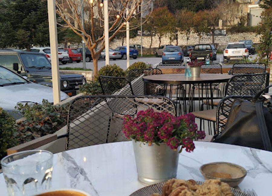 Savor authentic Greek cuisine at Agora 1955 in Portaria, where tradition meets innovation in a charming setting.