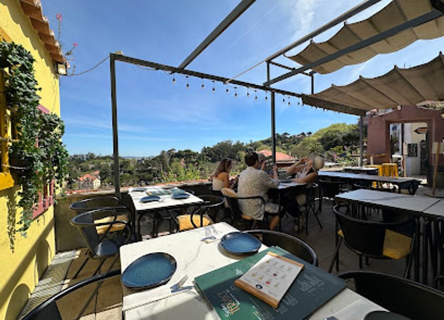 Experience exquisite dining at Sintra Terrace, where delicious local cuisine meets stunning panoramic views in the heart of Sintra.