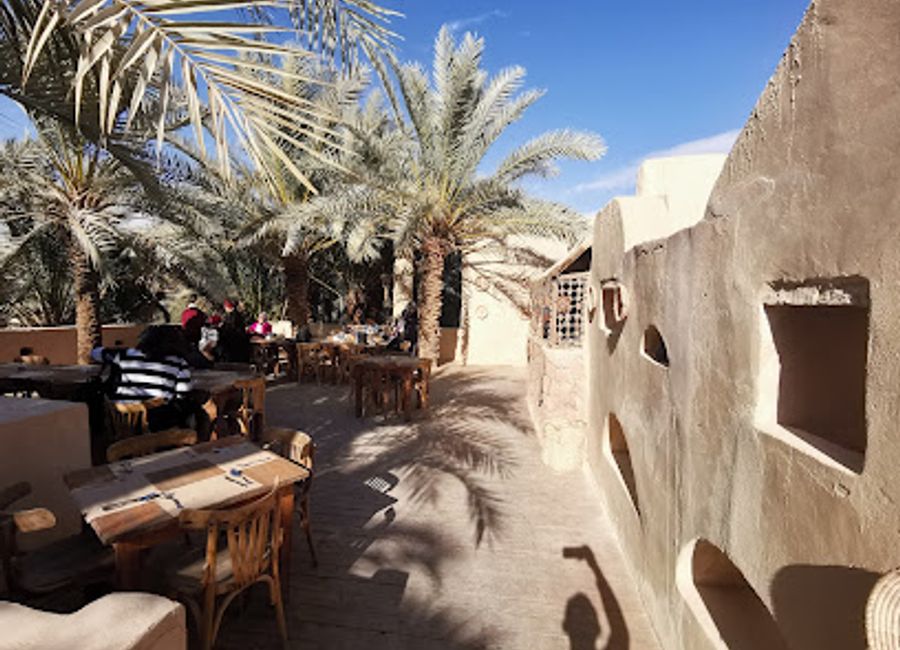 Experience authentic Egyptian cuisine at Kenooz Restaurant in Siwa's vibrant El Souk Square—a culinary gem steeped in local flavor.