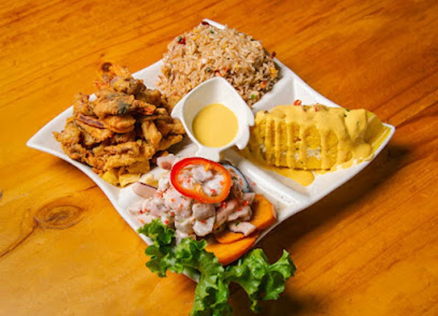 Savor fresh ceviche and vibrant seafood dishes at Cevicheria Restobar TECHITA in Ayacucho - where flavor meets fun!