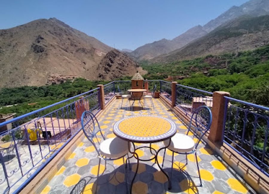 Experience authentic Moroccan cuisine at Restaurant Atlas Eco in Imlil while enjoying breathtaking views of the Atlas Mountains.