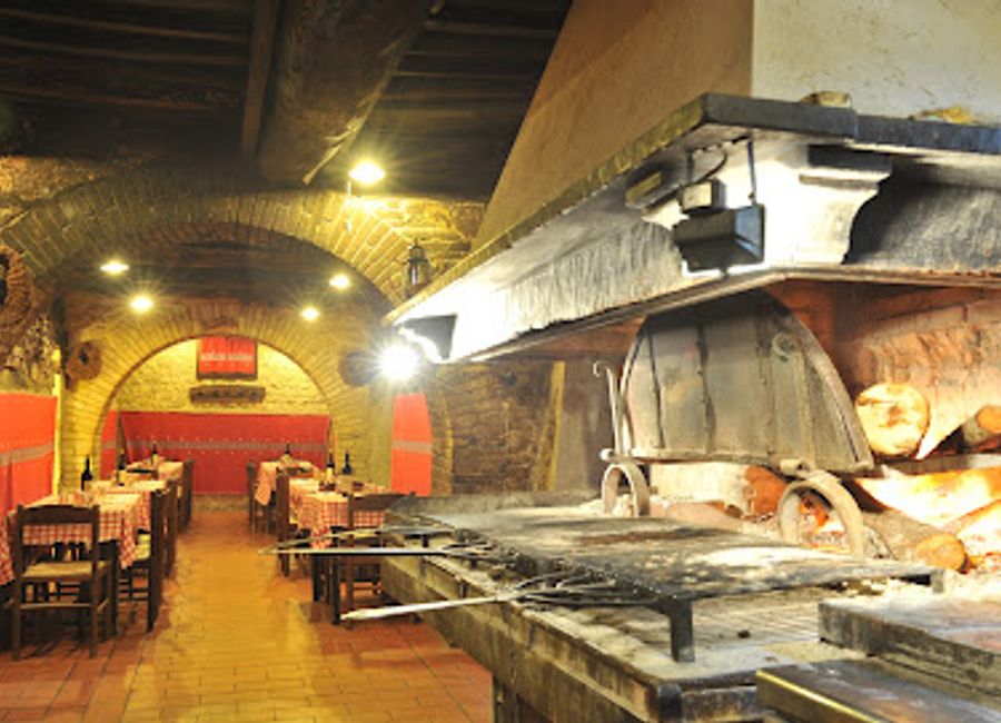 Experience authentic Italian cuisine at Ristorante La Stalla in Assisi - a perfect blend of local flavors and stunning views.