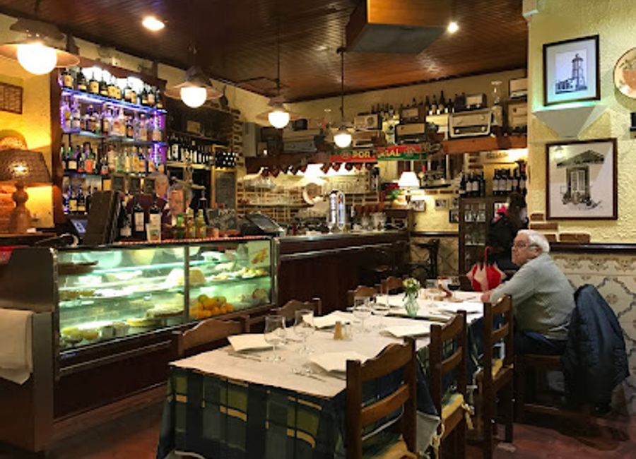 Experience authentic Portuguese cuisine at Dom Pipas in Sintra - where flavor meets tradition in a cozy atmosphere.