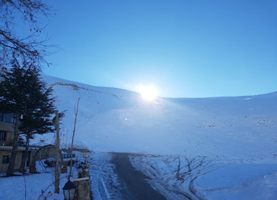 Savor authentic Lebanese flavors amidst stunning mountain views at Inchirah Restaurant in Bsharri.