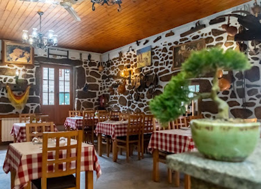 Experience authentic Portuguese cuisine at Restaurante Adega Ramalho in Gerês, where every dish tells a story of tradition and flavor.
