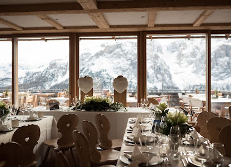 Experience exquisite Italian cuisine amidst breathtaking alpine views at Rifugio Col Pradat, a hidden gem in the Dolomites.