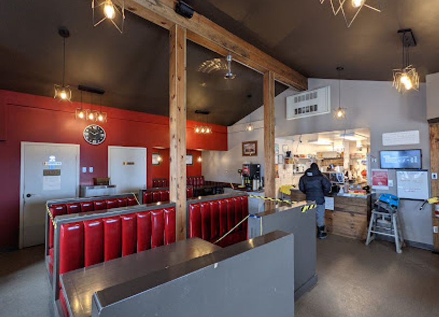 Experience local cuisine at The Snack in Iqaluit - where fast food meets traditional flavors in a cozy setting.