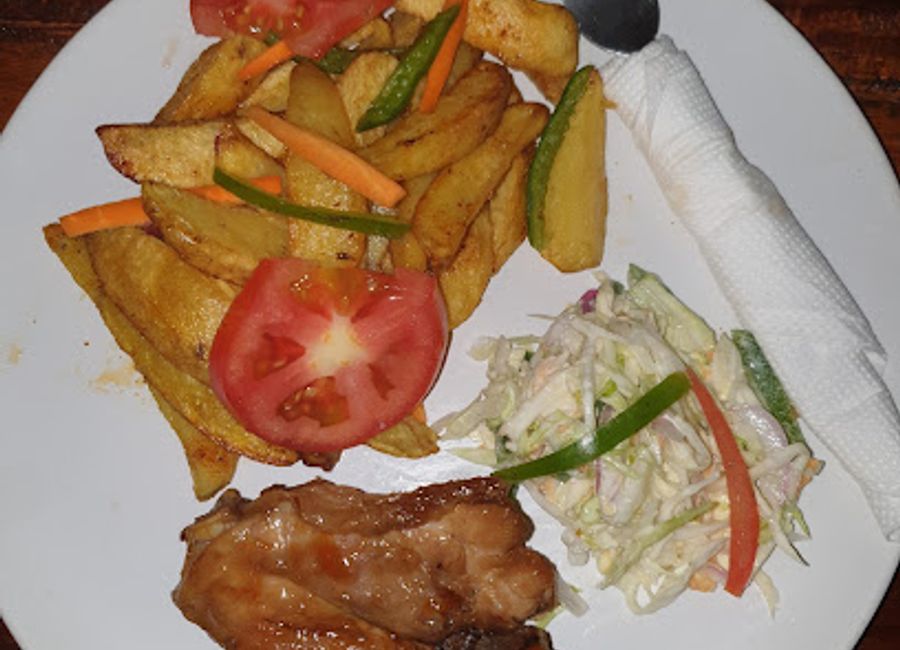 Experience delightful dining at Doves Eatery in Livingstonia - where families gather for delicious meals and warm hospitality.