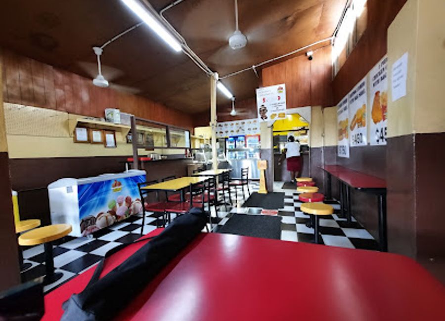 Savor authentic Jamaican jerk chicken at Portland Jerk Centre – a must-visit culinary hotspot in Port Antonio for food lovers!