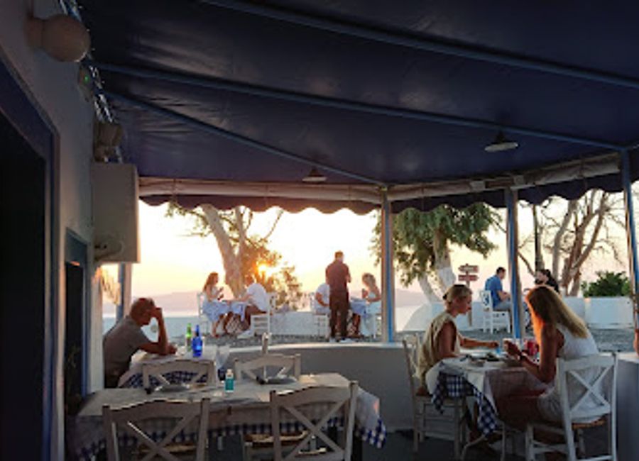 Experience authentic Greek flavors at Aktaion Restaurant while enjoying breathtaking views in Santorini.