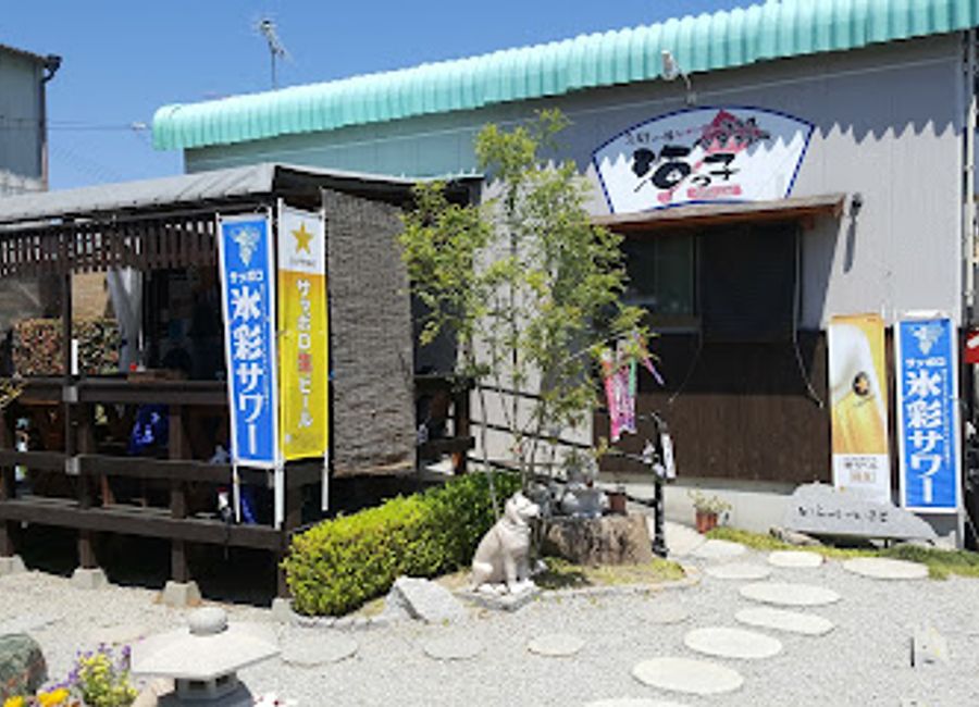 Savor authentic okonomiyaki at Okonomiyaki Umikko on Naoshima Island—where every bite celebrates local flavors and culinary artistry.
