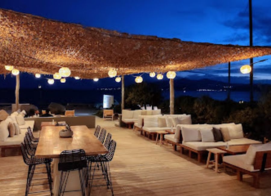 Discover Yazoo Summer Bliss: Where Authentic Greek Cuisine Meets Stunning Beachfront Views in Naxos.
