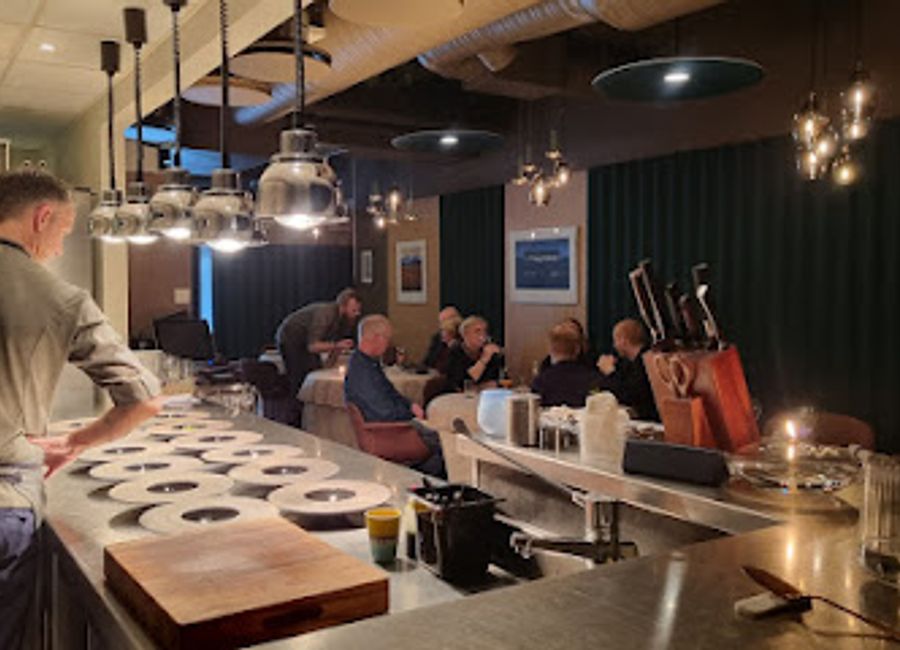 Experience exquisite dining at Restaurant Smak in Tromsø, where local flavors meet innovative cuisine in an elegant setting.