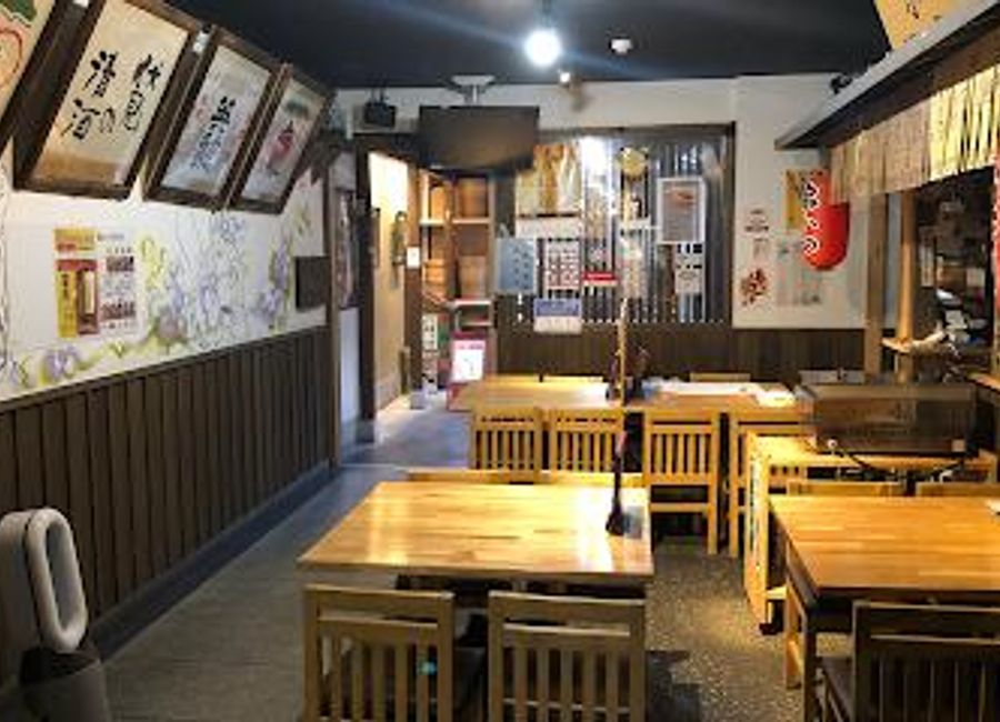 Experience authentic Japanese cuisine at Fushimi Sake Village - a culinary haven featuring izakayas and local sake brews.