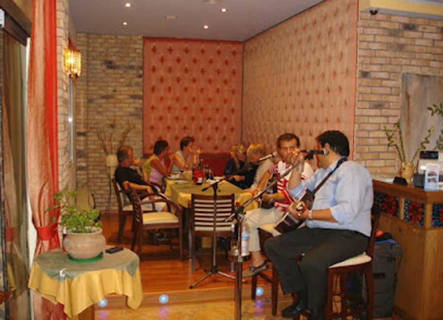 Experience authentic Greek cuisine at Delphi Restaurant in Agios Gordios - where tradition meets stunning views.