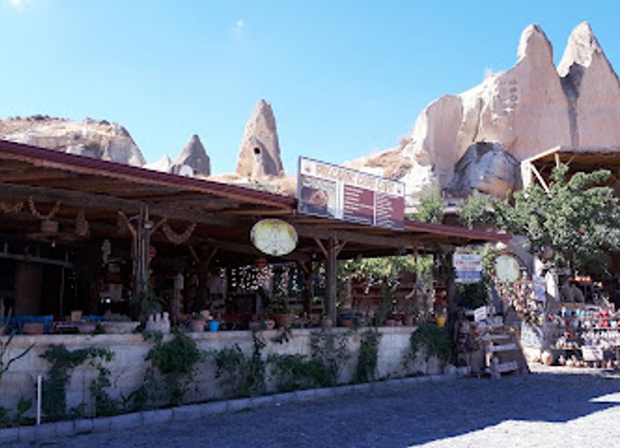 Experience authentic Turkish cuisine in a breathtaking cave setting at Volcanic Cave in Göreme.