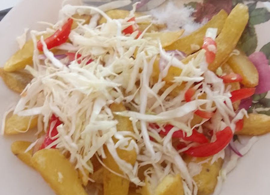 Discover authentic Malawian cuisine at a charming local restaurant in Livingstonia, where flavors meet hospitality for an unforgettable dining experience.