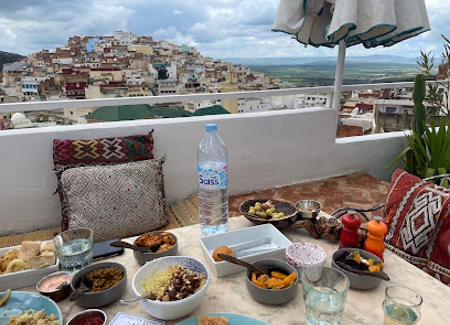 Discover authentic Moroccan flavors at Scorpion House in Moulay Idriss - a hidden gem serving delightful lunches amidst rich cultural heritage.