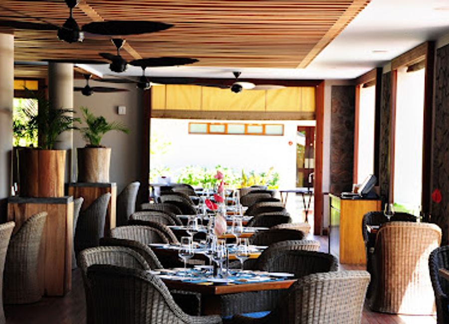 Discover exquisite dining at Cafe Lazare in Seychelles, where Mediterranean flavors meet local culinary delights amidst stunning ocean views.