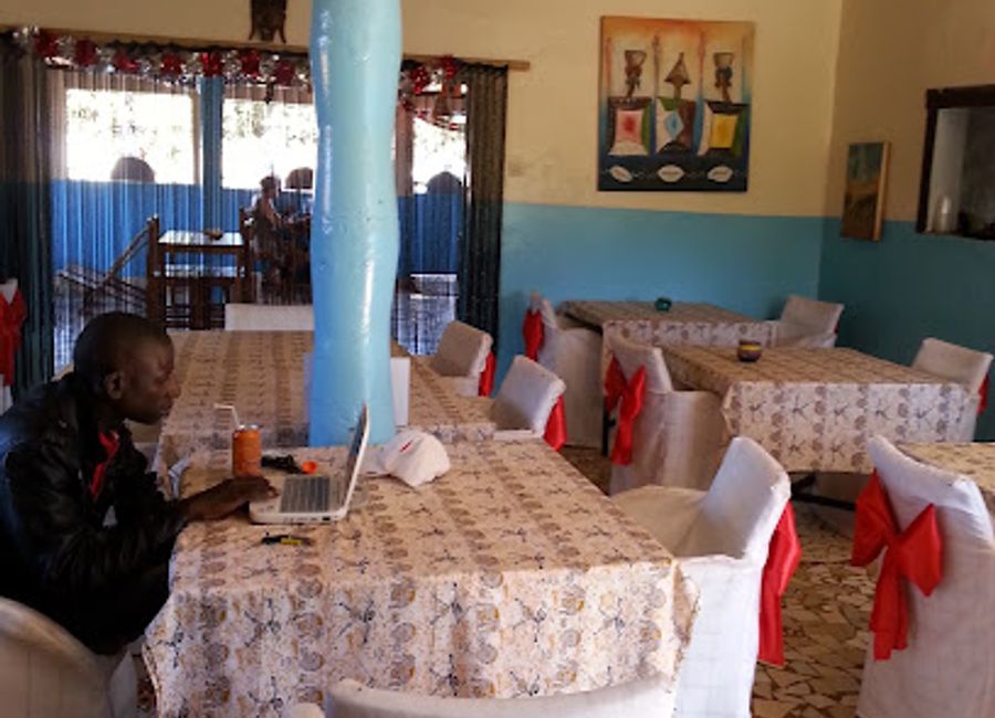Discover authentic Senegalese flavors at Chez Cathy in Kafountine - where delicious fast food meets local hospitality.