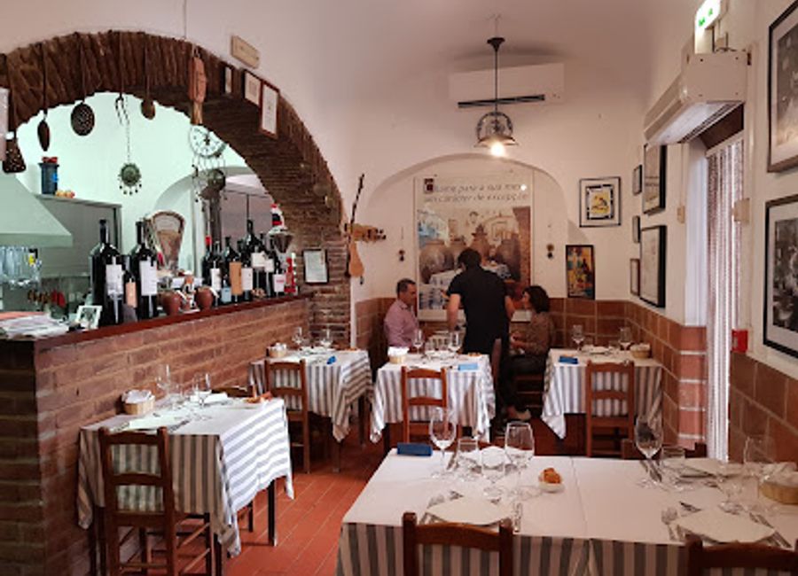 Discover the authentic taste of Alentejo at Taberna Típica Quarta-feira in Évora, where traditional flavors meet warm hospitality.