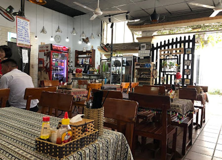 Experience authentic Vietnamese cuisine at Nina's Cafe in Hue - where flavor meets affordability in a cozy atmosphere.