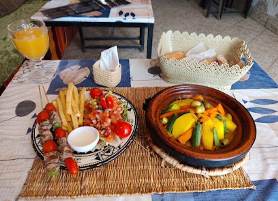 Savor authentic Moroccan cuisine and join engaging cooking classes at Restaurant Baghdad in Essaouira for an unforgettable culinary experience.