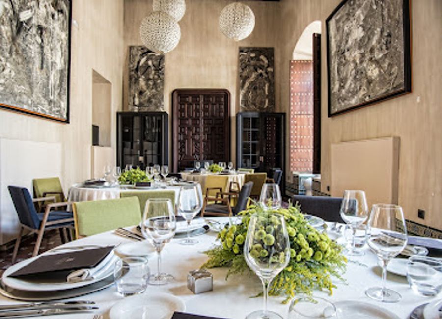 Experience authentic Mediterranean cuisine in Seville's historic Casco Antiguo at Restaurante Los Rincones del Marqués.