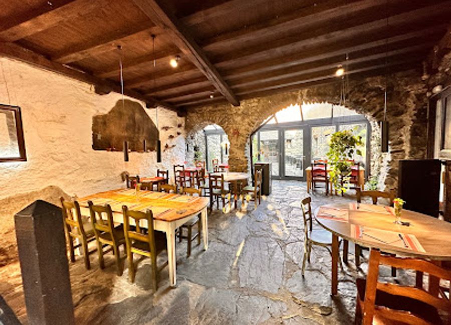 Experience authentic Catalan cuisine at Restaurante Alifara Taüll - where every dish tells a story amidst breathtaking mountain views.