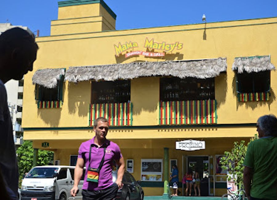 Experience authentic Jamaican cuisine at Mama Marley's in Ocho Rios - where vibrant flavors meet warm hospitality.