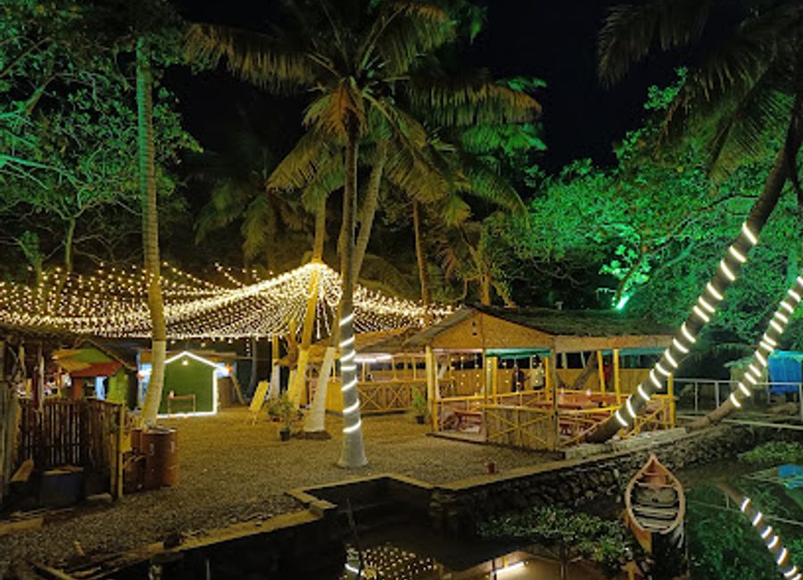 Discover authentic Keralan flavors at Cheenavala Backwater Cafe amidst Kochi's stunning backwaters.