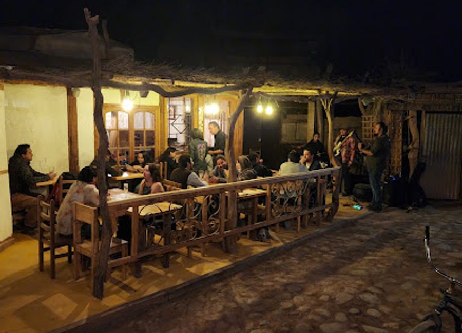 Experience authentic Chilean cuisine at Pulperia Atacama in San Pedro de Atacama, where tradition meets flavor in a vibrant atmosphere.