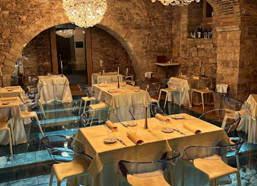 Experience authentic Italian cuisine at La Locanda del Cardinale in Assisi - where tradition meets elegance amidst stunning scenery.