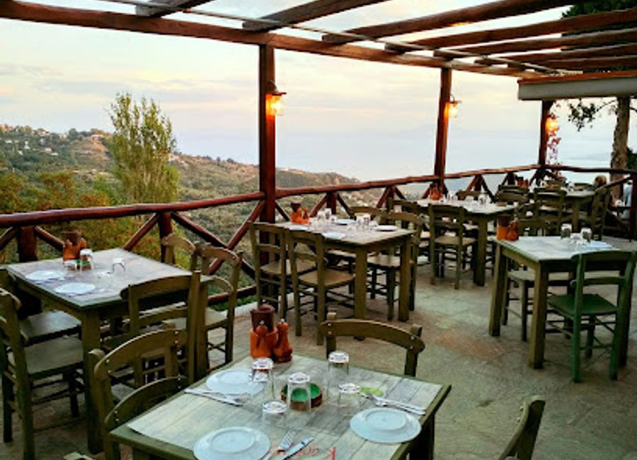 Experience authentic Greek cuisine at Cardamo Oinomageireio in Makrinitsa - where tradition meets breathtaking views.