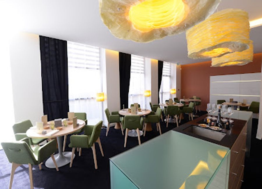 Experience culinary excellence at Le Neuvième Art, where French haute cuisine meets artistic presentation in the heart of Lyon.