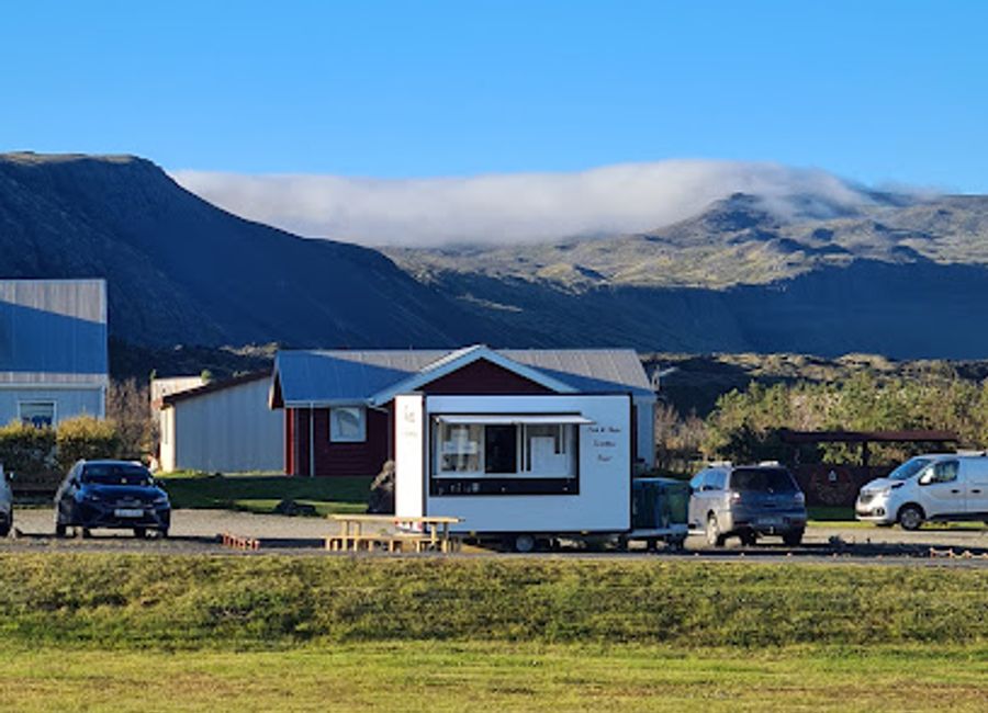 Experience authentic Icelandic street food at FRISTA Food Truck in Arnarstapi while enjoying stunning views of nature's beauty.