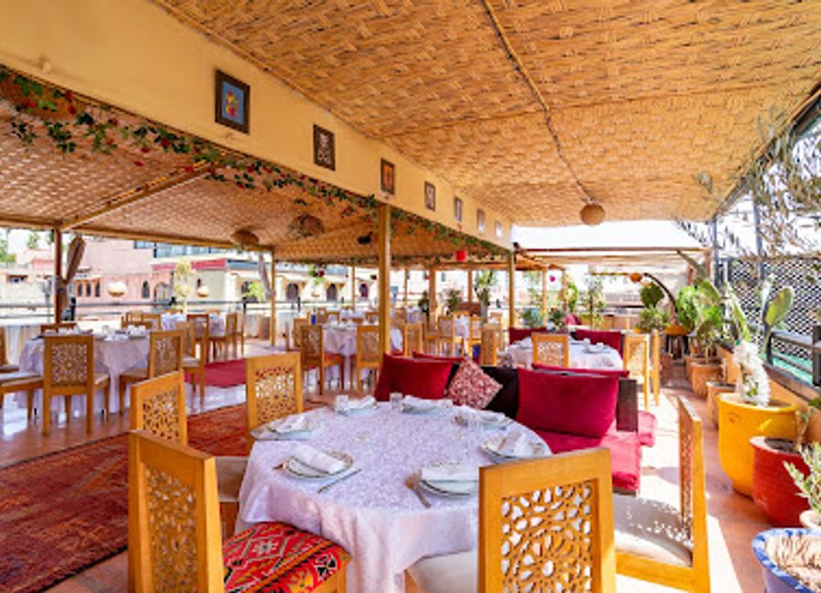 Experience authentic Moroccan cuisine with breathtaking rooftop views at Al Khayma Marrakech.