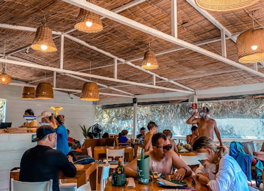 Experience delectable Brazilian cuisine with ocean views at Restaurante Abençoado in Fernando de Noronha.