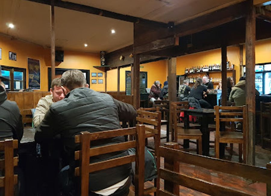 Experience authentic Chilean cuisine at Slowly Bar in Puerto Natales - where local flavors meet cozy ambiance.