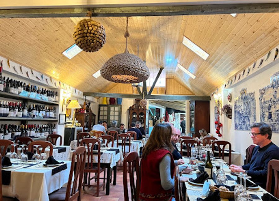 Experience authentic Portuguese cuisine at Canto dos Trovadores in Sintra, where tradition meets contemporary dining amidst stunning surroundings.