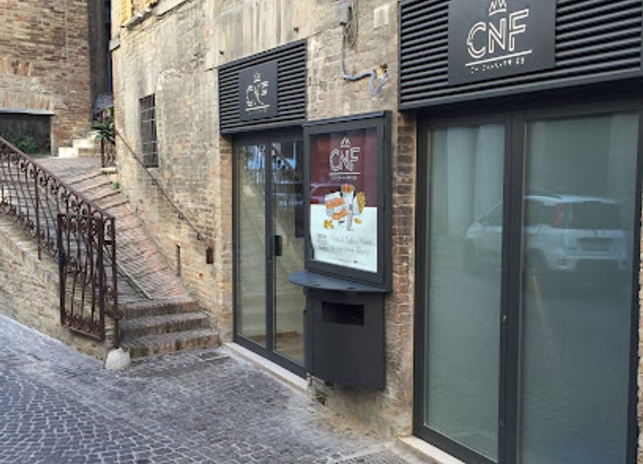 Experience delicious fast food at Ristorante CNF in Urbino - where chicken and fries meet exceptional flavor!