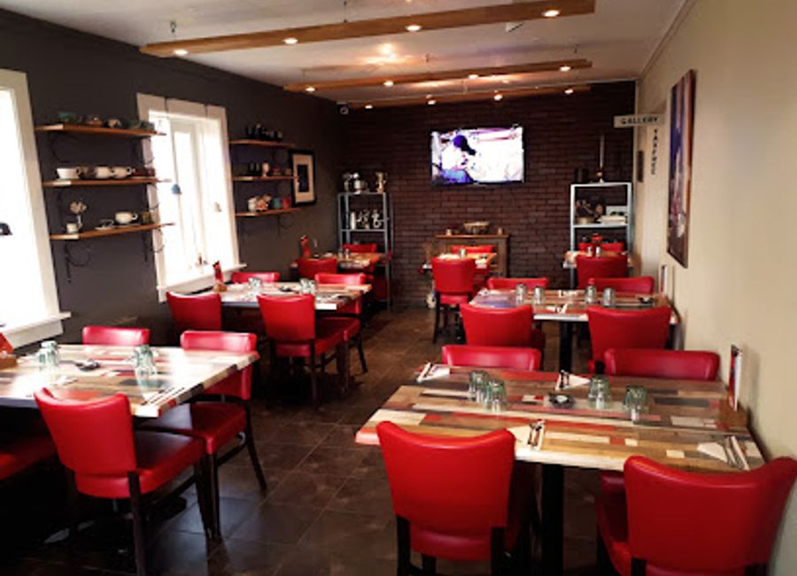 Discover the culinary artistry at Eldstó Art Cafe / Restaurant in Hvolsvöllur - where fine dining meets local artistry amidst stunning Icelandic scenery.