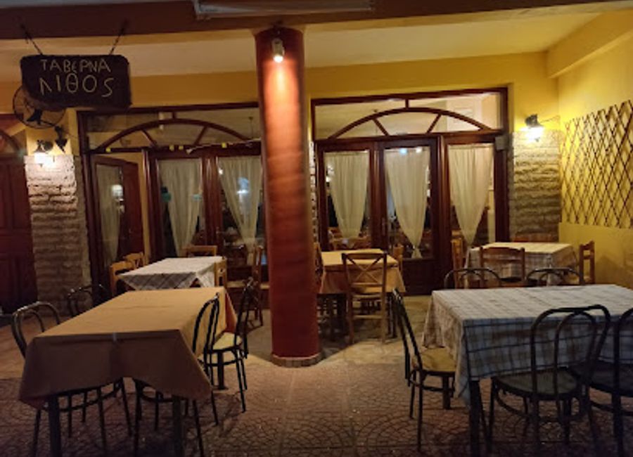 Discover Taverna Lithos in Kastraki - where traditional Greek grilling meets warm hospitality for an unforgettable dining experience.