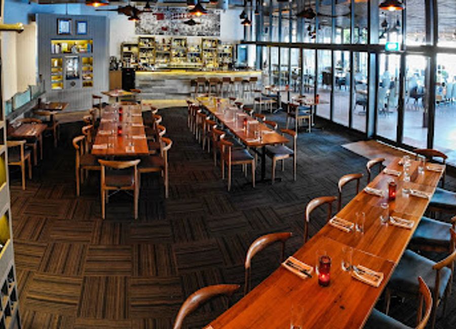 Experience modern Australian cuisine with stunning waterfront views at Ochre Restaurant in Cairns.