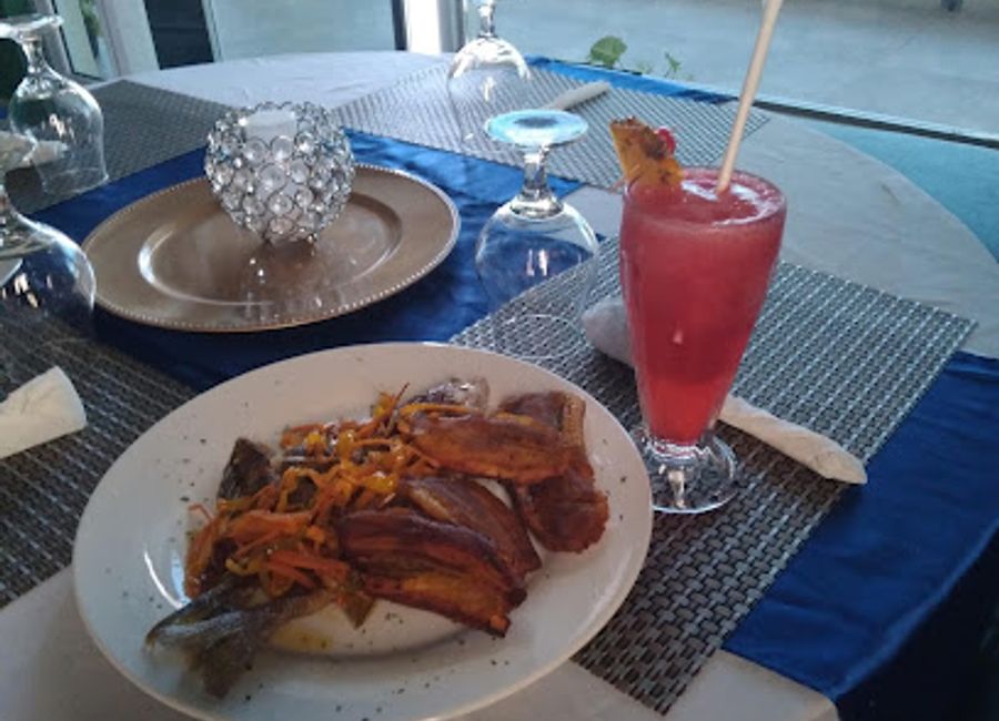 Experience exquisite Jamaican cuisine at Coastline Bliss in Port Antonio - where every meal comes with stunning ocean views.