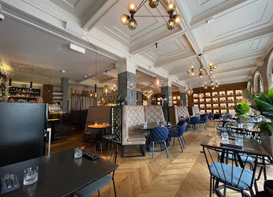 Discover Apotek Restaurant: A Modern European Culinary Experience in Reykjavík's Heart with Eclectic Flavors and Chic Ambiance.